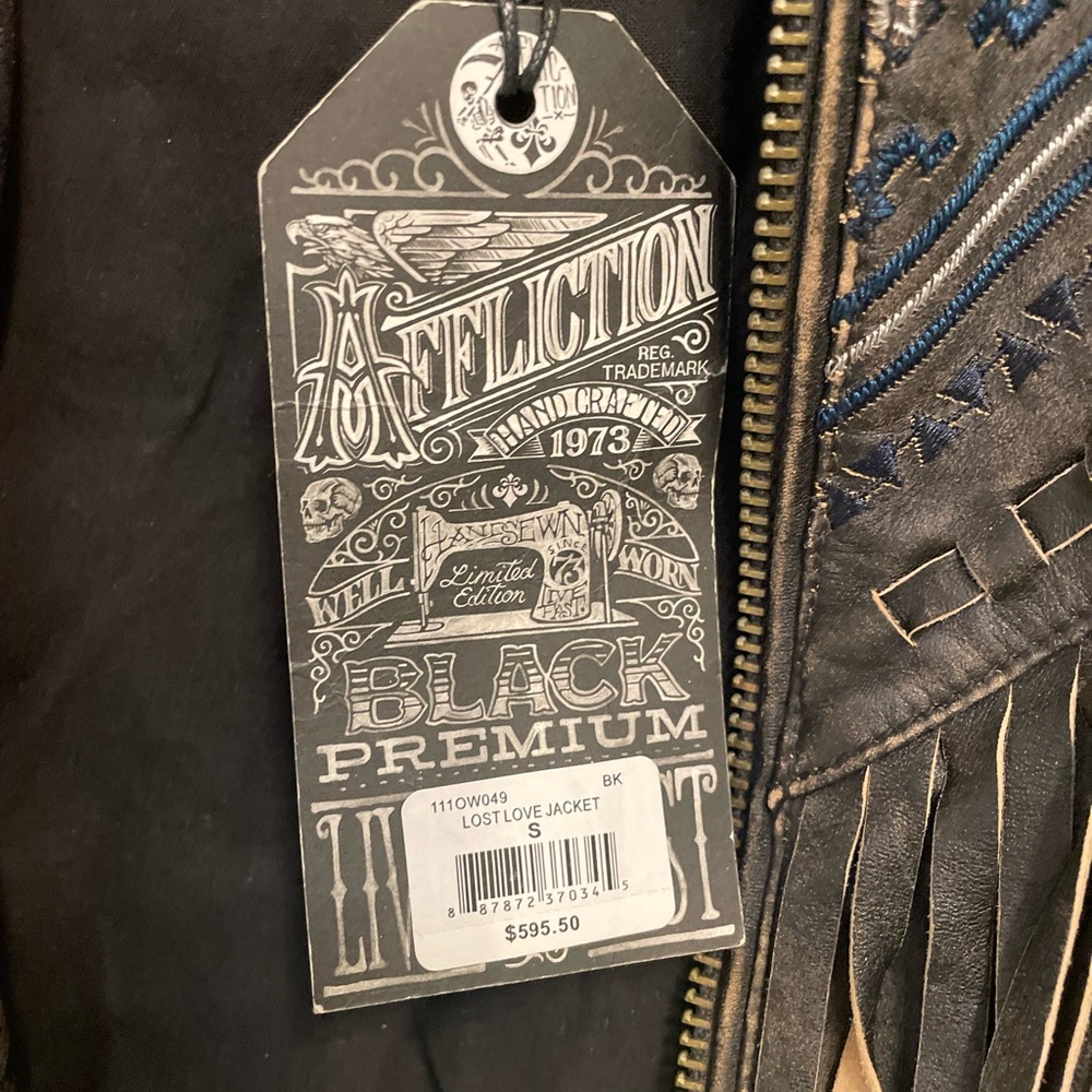 Brand new women’s Affliction leather jacket with detail.